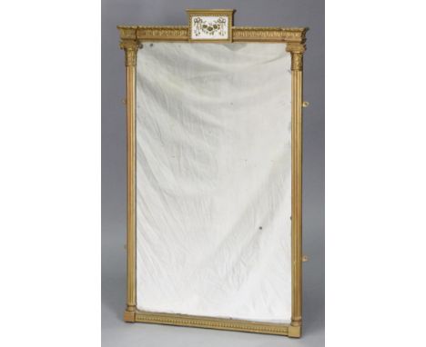 A regency gilt-frame rectangular pier glass, inset verre-eglomise glass panel to the foliate cornice, flanked by fluted archi