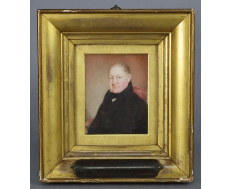 ENGLISH SCHOOL, mid-19th century. A portrait miniature of Dr Stewart Crawford, M.D., wearing dark coat, seated in an armchair