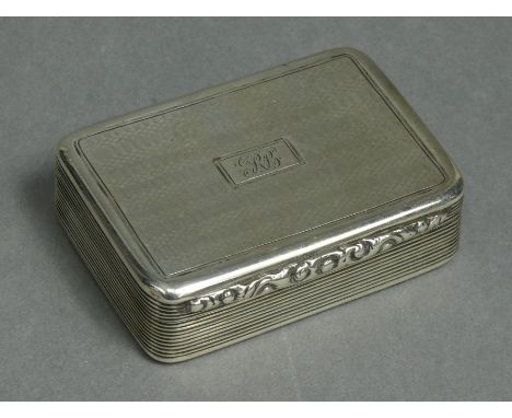 A William IV silver rectangular snuff box, engine-turned &amp; with reeded sides, carved scroll thumb-catch to the hinged lid
