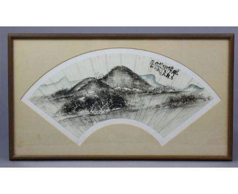 A Chinese monochrome watercolour painting on fan leaf, of a mountainous river landscape, inscribed with calligraphy &amp; sig