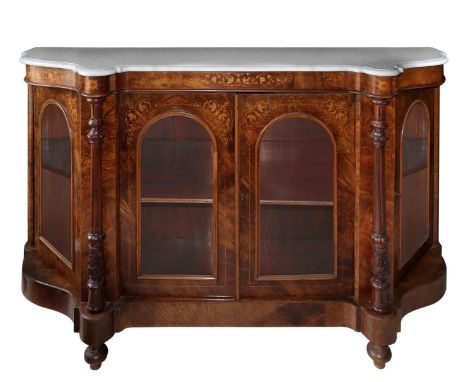 On the front there are columns on the sides, inlaid with light woods. White marble shaped on the top. Onion feet.  H 99 cm x 