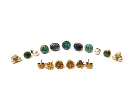 A pair of gold and jade single stone ear studs, each of circular form, the backs with post and butterfly clip fittings, seven