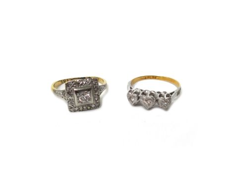 A gold and platinum, diamond set square cluster ring, mounted with the principal circular cut diamond at the centre, in a sur