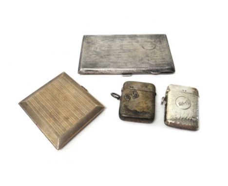 A late Victorian silver vesta case, with applied initials, Chester,1899, a silver vesta case, with beaten finish,Birmingham,1