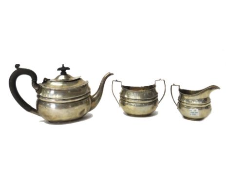 A silver three piece tea set, Birmingham 1916, gross weight 650 gms, (3).