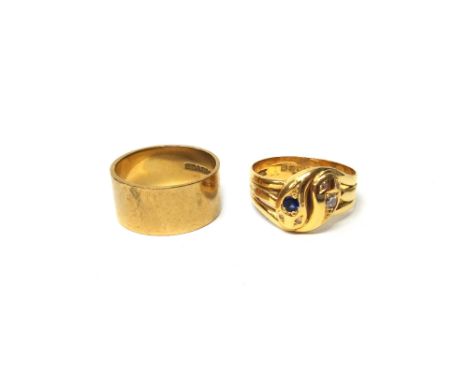 An 18ct gold, sapphire and diamond ring, designed as two conjoined serpent's heads, both with diamond set eyes, London probab