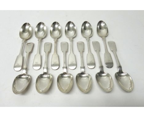 A set of twelve Scottish silver fiddle pattern dessert spoons, each engraved with the initial K, Glasgow 1858, combined weigh