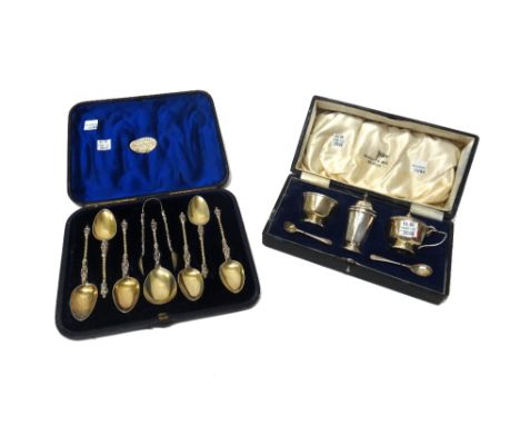 A set of six Victorian silver gilt apostle teaspoons, with a matching pair of sugar tongs and caddy spoon, London 1867, with 