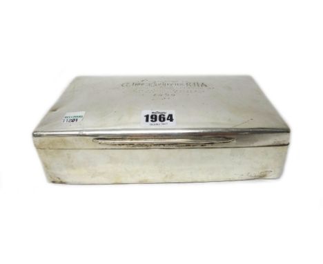 A large late Victorian silver mounted cigarette box, of plain rectangular form, the cover presentation engraved, the interior