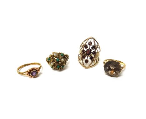 A 9ct gold and garnet set ring, in a pierced openwork design, a 9ct gold, turquoise and cultured pearl set ring, in an abstra