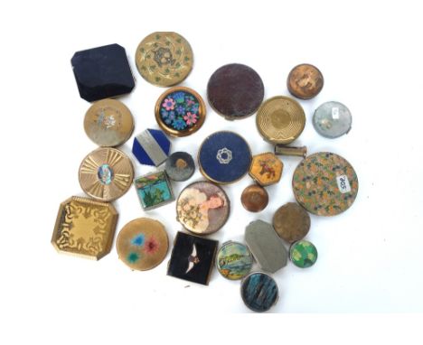 A quantity of ladies compacts, including; an octagonal 'Bourjois' white metal and enamel compact, Kwick, a gilt metal compact
