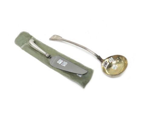 A Victorian silver double struck fiddle, thread and shell pattern soup ladle, London possibly 1858, weight 303 gms and a Tiff