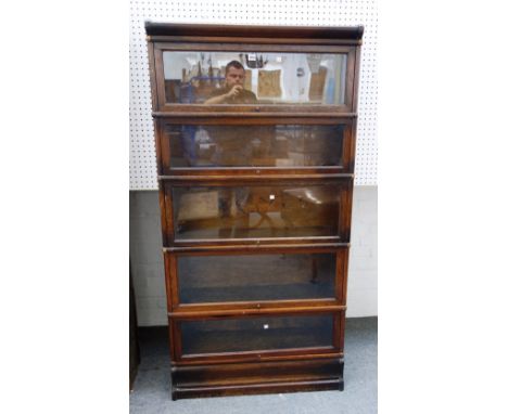 An oak five section Globe Wernicke bookcase, 87cm wide x 176cm high x 27cm deep.