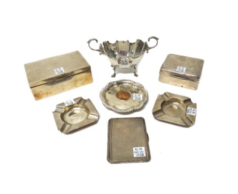 Silver and silver mounted wares, comprising; a small rectangular cigarette box, wooden lined within, a twin handled sugar bow