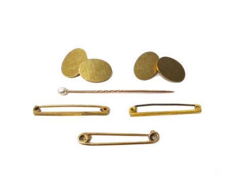 A pair of 9ct gold oval cufflinks, with plain backs and fronts, Birmingham 1958, weight 12.4 gms, three 9ct gold brooches and