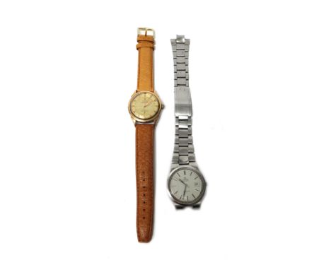 A gentleman's gilt and steel Omega Constellation Automatic wristwatch, the signed dial, with gilt arrow shaped numerals, gilt