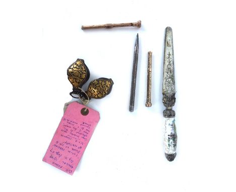 A silver plated letter opener with a Meissen style porcelain handle, 24cm long, two Persian steel and brass inlaid sword moun