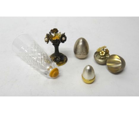 Silver and silver mounted wares, comprising; a parcel gilt model of an acorn, opening to reveal two squirrels, a parcel gilt 