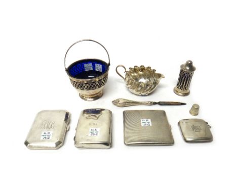 Silver and silver mounted wares, comprising; three cigarette cases, a Sterling handled nail file, a milk jug, with spiral flu