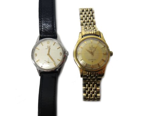 A gentleman's gilt metal and steel Omega Constellation Automatic bracelet wristwatch, the signed dial with gilt arrow shaped 