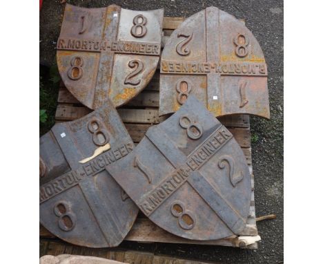 Four cast iron shields, possibly drain covers or wall bosses, each cast in relief 'R. Morton Engineer 1882', 60cm high, (4).