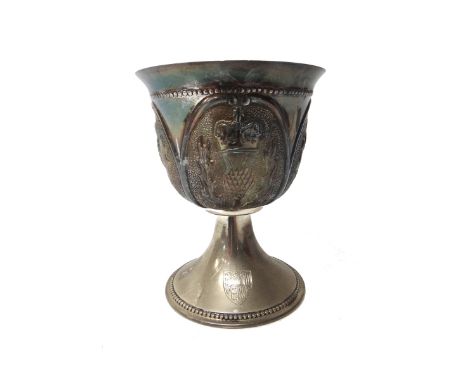 A Scottish silver goblet, the body having four panels decorated with thistles, raised on a trumpet shaped base, engraved with