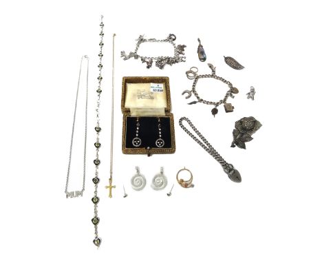 An 18ct gold and diamond set pendant cross, with a gold neckchain, detailed 9 K, a pair of silver and colourless paste set pe