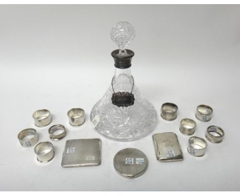 Silver and silver mounted wares, comprising; a faceted glass ships decanter, with a decanter label detailed Port, two cigaret