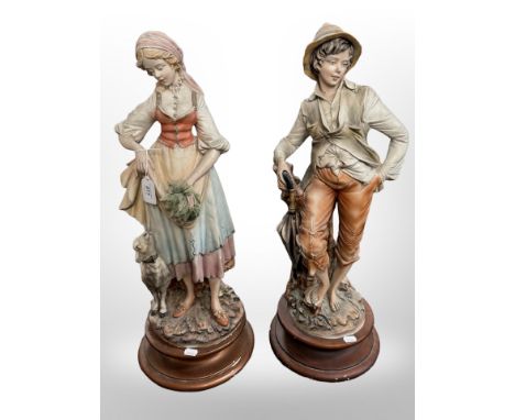 A large pair of continental bisque figures of a lady and gentleman, height 62 cm.