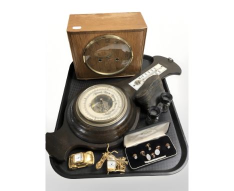 A Smith Art Deco mantel clock, oak barometer, small pair of opera glasses, gold plated dress studs, two small time pieces: ca