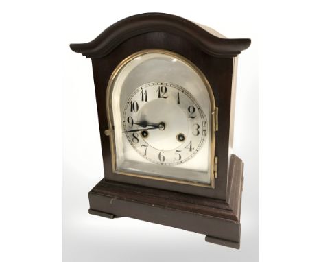An early 20th century mantel clock with silvered dial and Junghans movement, with pendulum, no key 