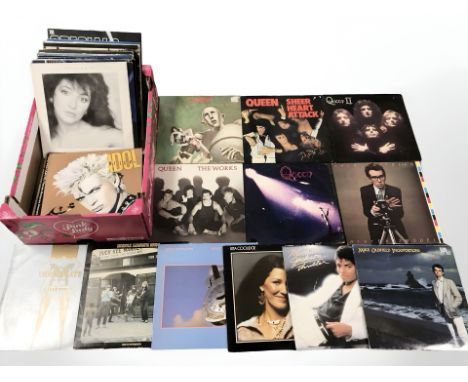 Vinyl LP records including Queen, Kate Bush, Elvis Costello, Michael Jackson, Dire Straits, Creedence Clearwater Revival, Bil
