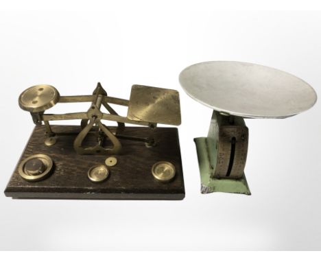 A set of Victorian letter scales with weights and a further scale.