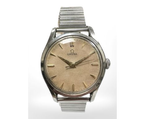 A gent's stainless steel Omega centre seconds wristwatch, ref. 2640-4, circa 1952, the honeycomb dial with aged patina, gilt 