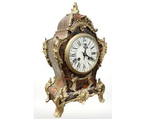 A 19th century French Louis XV style boulle and gilt metal mounted mantel clock, the movement by A. D. Mougin, striking on a 