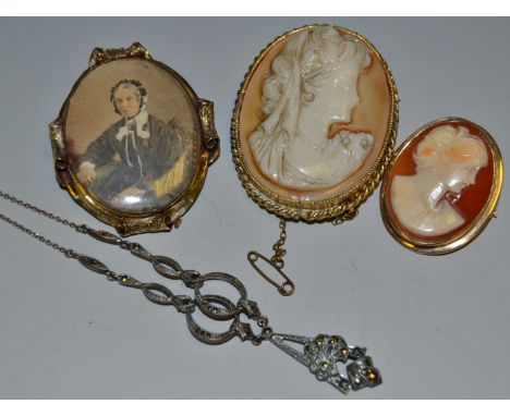 A Victorian mourning locket, with portrait miniature, the verso with clear back, c.1880;  cameo's;  marcasite mecklace