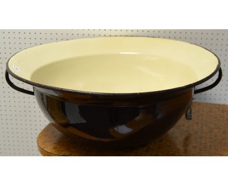 A Hungarian enamel twin handled mixing bowl 