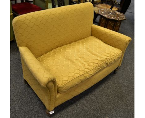 A Victorian sofa , bun feet, castors, c.1880