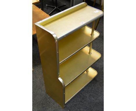 A mid 20th century Woodmet, Dukinfield Cheshire four tier book shelf , brush gold coloured aluminium frame 