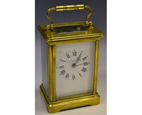 An early 20th century lacquered brass carriage timepiece, the enamel dial inscribed Wm. Burford & Son, Eastbourne & Exeter, c