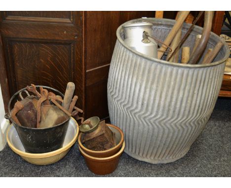 A galvanised wash tub; copper dolly punch, another smaller; cream copper churn; coffee grinder; tools; galvanised bucket; etc