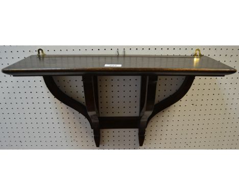 A Liberty of London Arts and Crafts oak book shelf