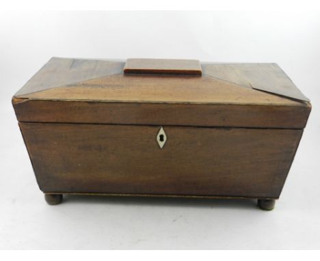 A 19th Century mahogany tea caddy, sarcophagus form, set two containers, raised circular bun feat L.33.5cm H.17cm