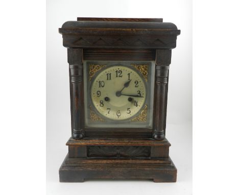 A late 19th century oak cased bracket clock, having Arabic breguet dial and set 8 day movement chiming gong. H.37cm W.28cm