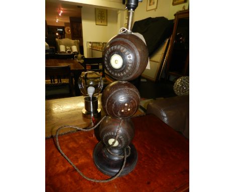 An unusual novelty table lamp, fashioned as three bowling balls. H.55cm