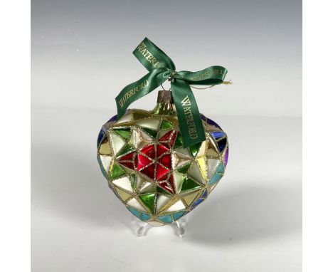 Handcrafted ornament with a stained glass design that forms a beautiful heart, featuring a geometric pattern with vibrant col