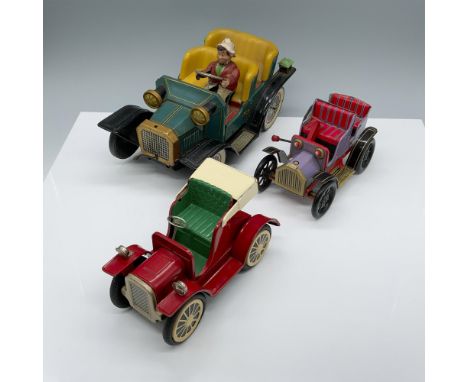 Charming assortment of vehicles that includes a larger battery operated Japanese made four seater, a red two seater, and a cr