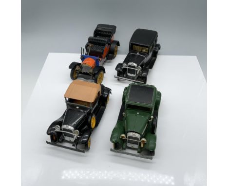 Darling collection of 3 Hubley green and black vehicles and 1 wind up Schuco Mercedes model. Largest item measures 8"L x 3.5"