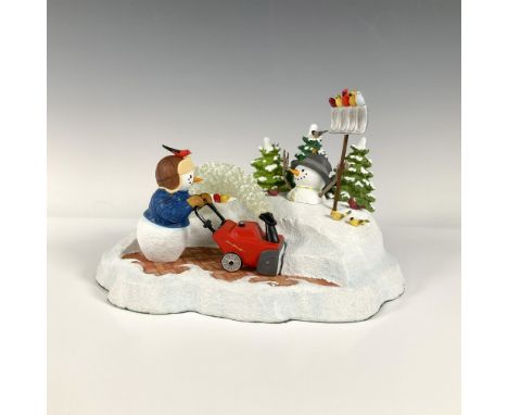 This hand painted, resin figurine features a pair of snowmen shoveling snow. Marked Lenox. This item has its original box. Bo