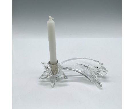 Streaking figure in clear crystal with crystal rhinestones on its tail. Rhodium cup to hold single candle. Swarovski backstam
